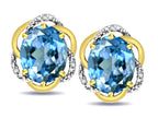 Star K  Large Love Knot Earrings with Oval 8 x 6mm Genuine Blue Topaz