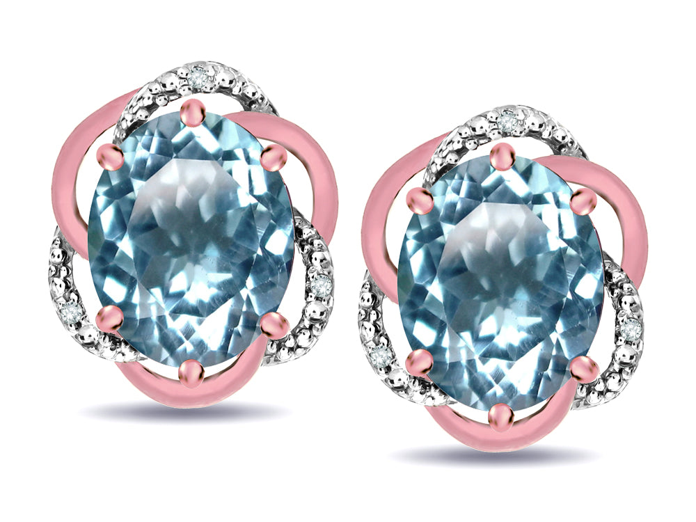 Star K  Large Love Knot Earrings with Oval 8 x 6mm Genuine Sky Blue Topaz