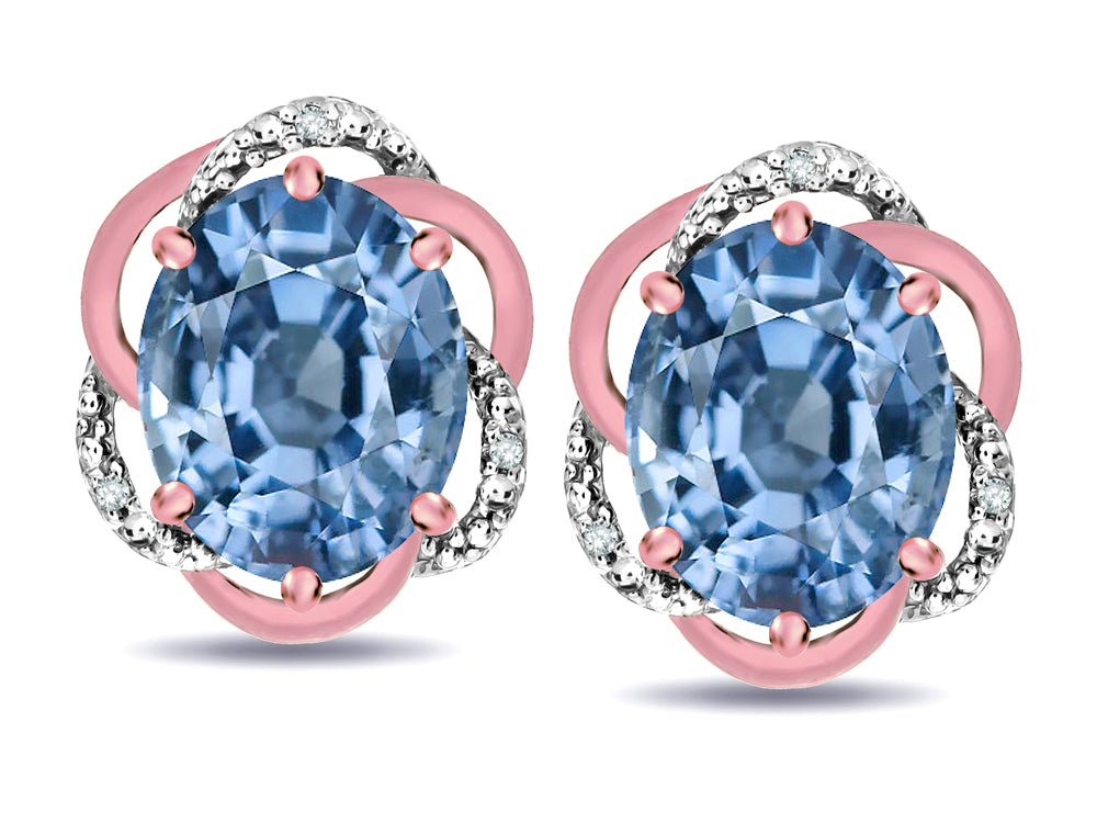 Star K  Large Love Knot Earrings with Oval 8 x 6mm Simulated Aquamarine