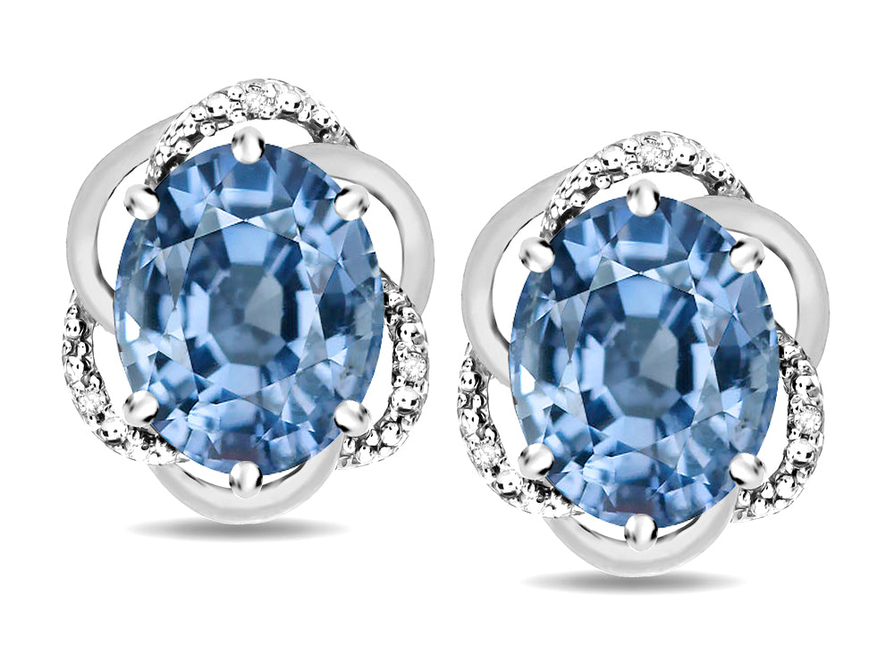 Star K ™ Large Love Knot Earrings with Oval 8 x 6mm Simulated Aquamarine