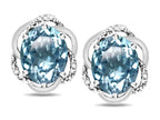 Star K  Large Love Knot Earrings with Oval 8 x 6mm Genuine Sky Blue Topaz