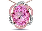 Star K  Large Love Knot Pendant Necklace with Oval 12 x 10mm Created Pink Sapphire