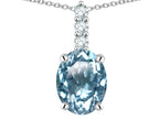 Star K  8x6mm Oval Genuine Sky Blue Topaz Three Stone Pendant Necklace