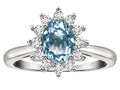 Star K ™ Classic Lady Diana Halo Oval 7x5 Genuine Sky Blue Topaz Ring