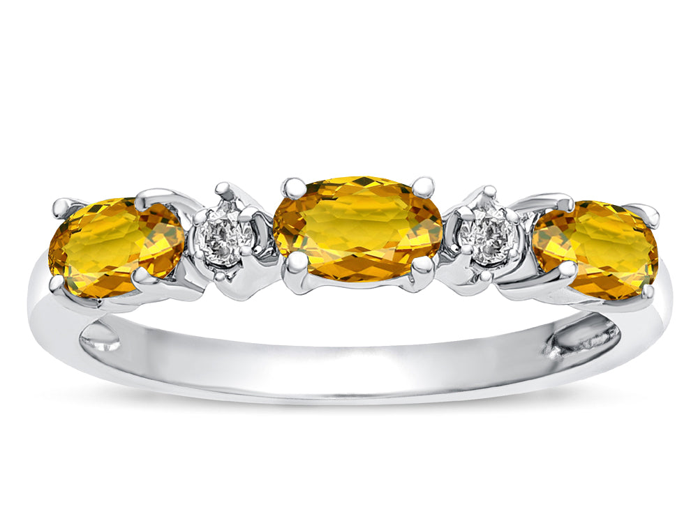 Star K  Oval 5x3 Genuine Citrine three stone oval band