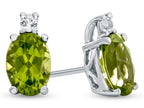 FJC Finejewelers 10k White Gold 7x5mm Oval Peridot with White Topaz Earrings