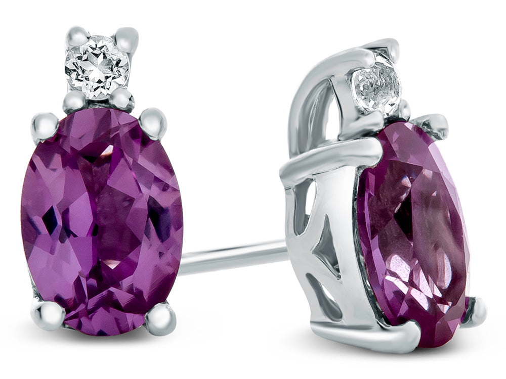 FJC Finejewelers 10k White Gold 7x5mm Oval Simulated Alexandrite with White Topaz Earrings