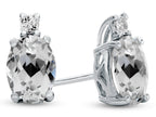 FJC Finejewelers 10k White Gold 7x5mm Oval White Topaz Earrings