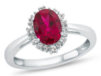 FJC Finejewelers 10k White Gold 8x6mm Oval Created Ruby with White Topaz accent stones Halo Ring
