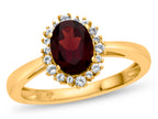 FJC Finejewelers 10k Yellow Gold  8x6mm Oval Garnet with White Topaz accent stones Halo Ring
