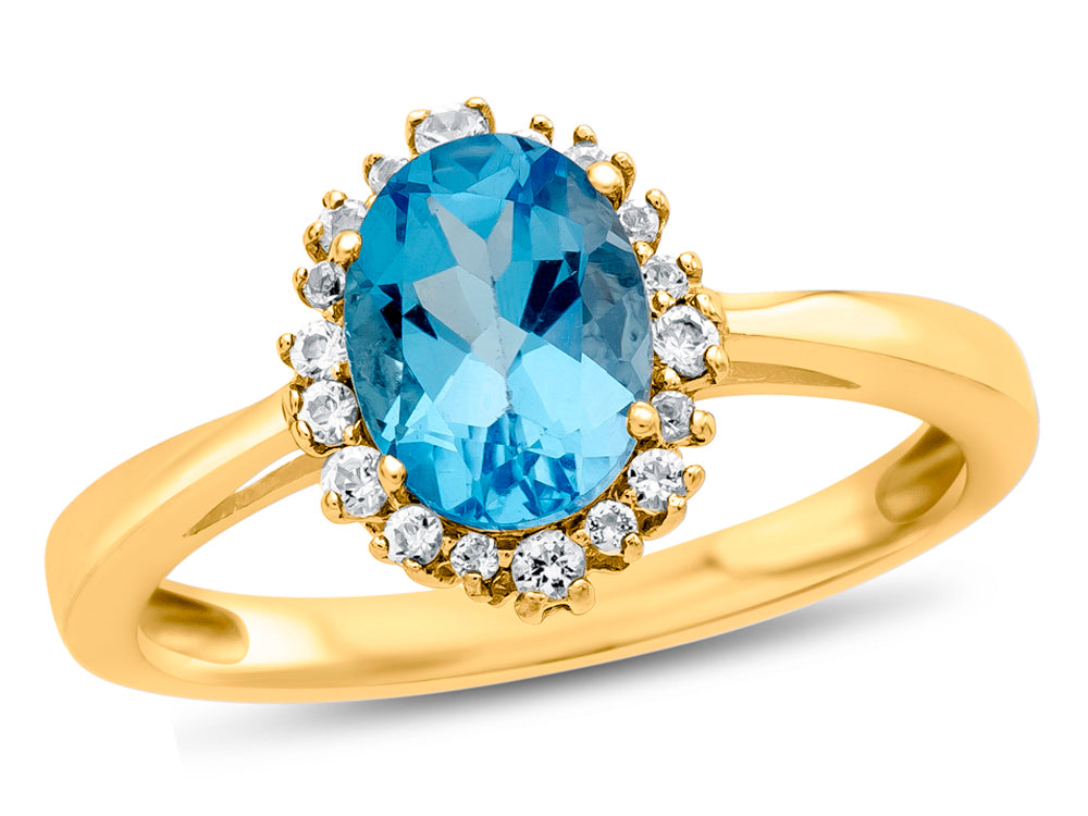 FJC Finejewelers 10k Yellow Gold 8x6mm Oval Swiss Blue Topaz with White Topaz accent stones Halo Ring