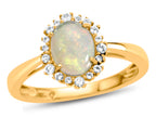 FJC Finejewelers 10k Yellow Gold 8x6mm Oval Opal with White Topaz accent stones Halo Ring