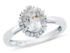 FJC Finejewelers 10k White Gold 8x6mm Oval White Topaz with White Topaz accent stones Halo Ring