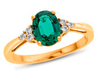 FJC Finejewelers 10k Yellow Gold 8x6mm Oval Created Emerald and White Topaz Ring