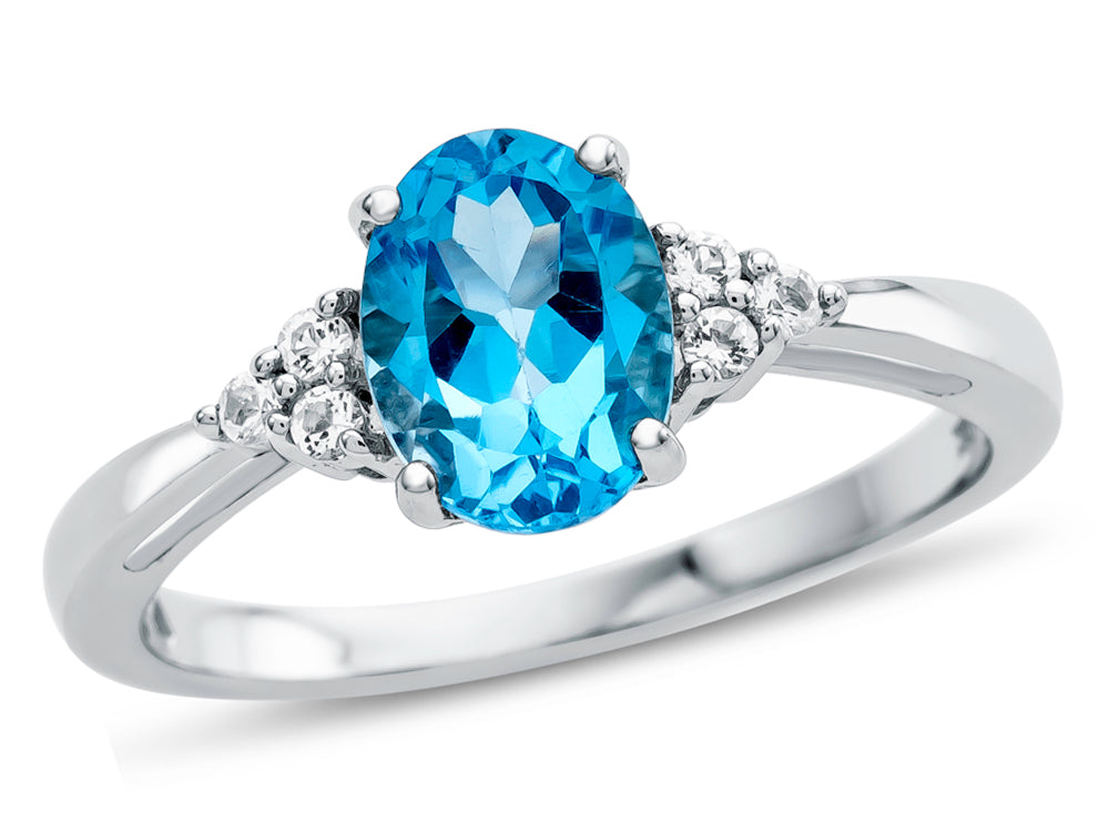 FJC Finejewelers 10k White Gold 8x6mm Oval Swiss Blue Topaz and White Topaz Ring