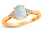 FJC Finejewelers 10k Yellow Gold 8x6mm Oval Created Opal and White Topaz Ring