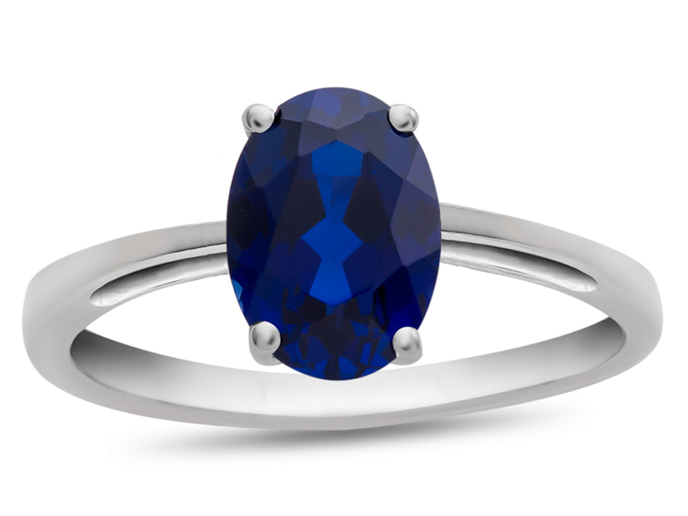 FJC Finejewelers 10k White Gold 7x5mm Solitaire Oval Created Blue Sapphire Ring