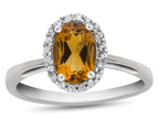 FJC Finejewelers 10k White Gold 7x5mm Oval Citrine with White Topaz accent stones Halo Ring
