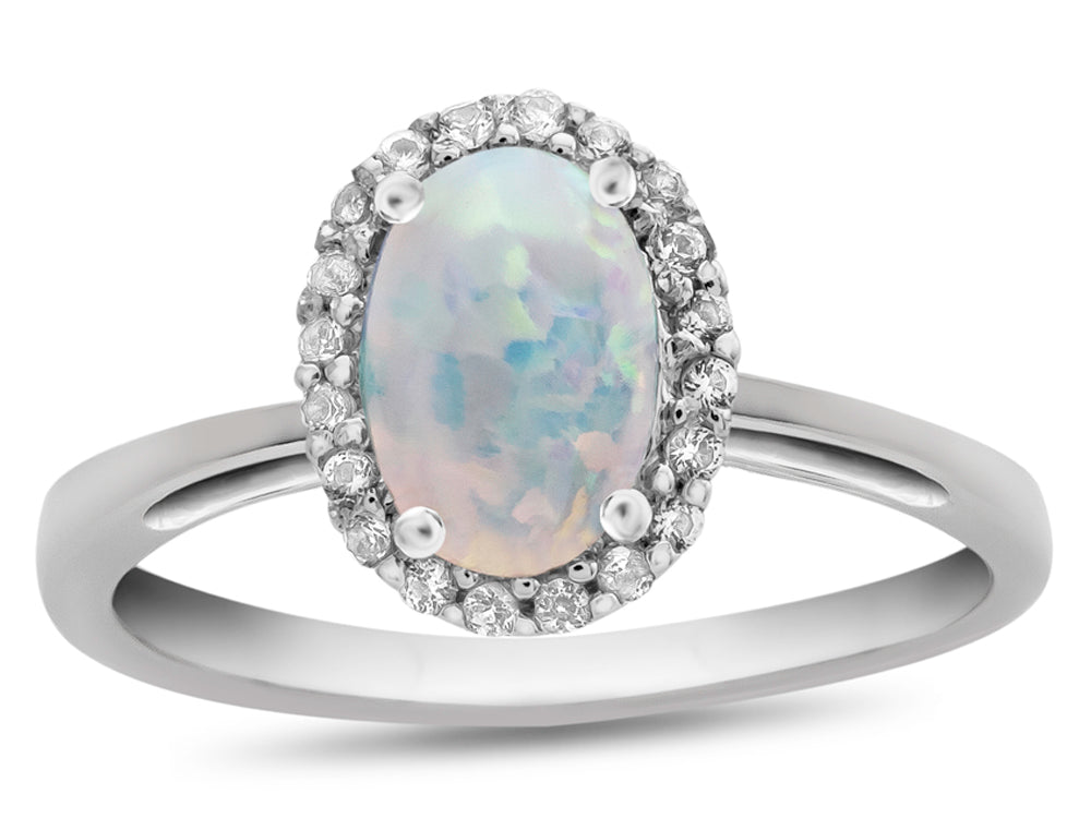 FJC Finejewelers 10k White Gold 7x5mm Oval Created Opal with White Topaz accent stones Halo Ring