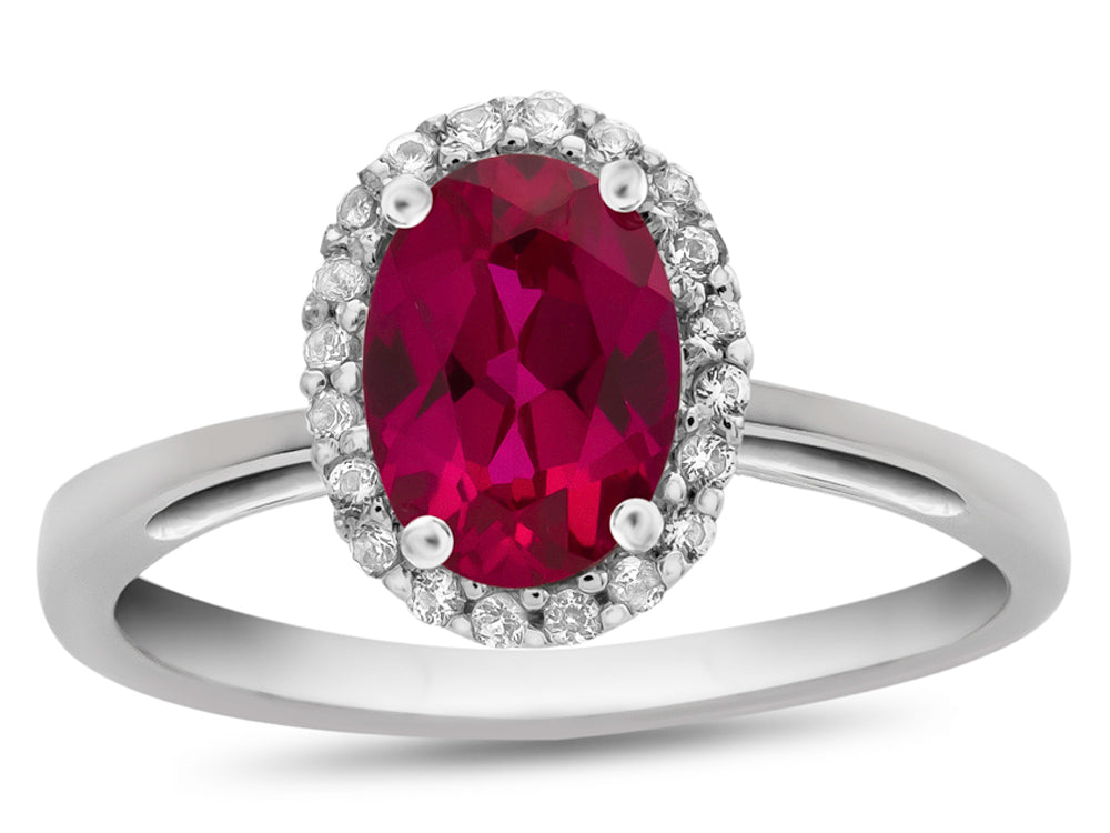 FJC Finejewelers 10k White Gold 7x5mm Oval Created Ruby with White Topaz accent stones Halo Ring