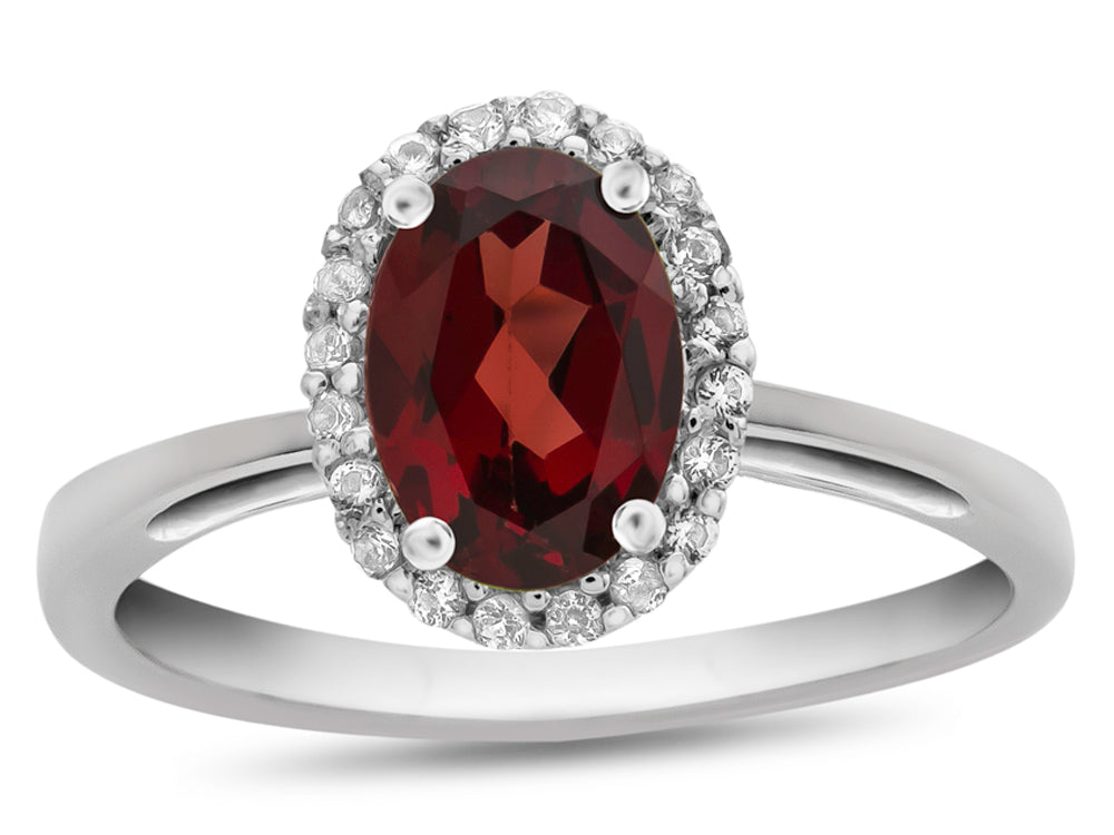 FJC Finejewelers 10k White Gold 7x5mm Oval Garnet with White Topaz accent stones Halo Ring