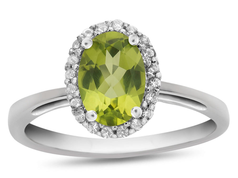 FJC Finejewelers 10k White Gold 7x5mm Oval Peridot with White Topaz accent stones Halo Ring