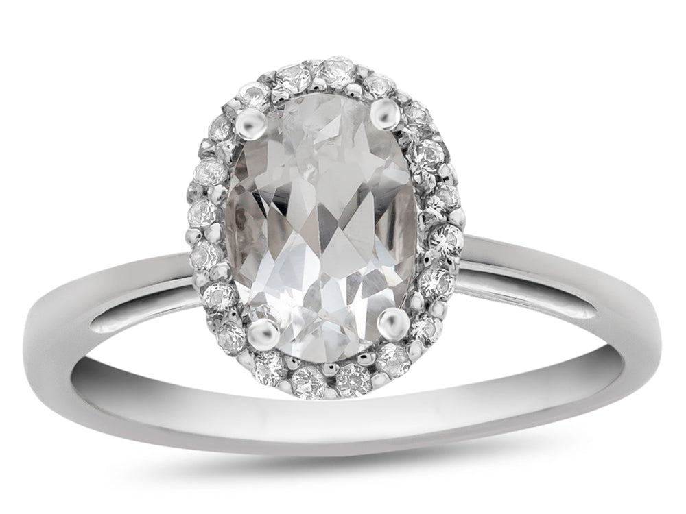 FJC Finejewelers 10k White Gold 7x5mm Oval White Topaz with White Topaz accent stones Halo Ring