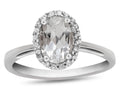 FJC Finejewelers 10k White Gold 7x5mm Oval White Topaz with White Topaz accent stones Halo Ring