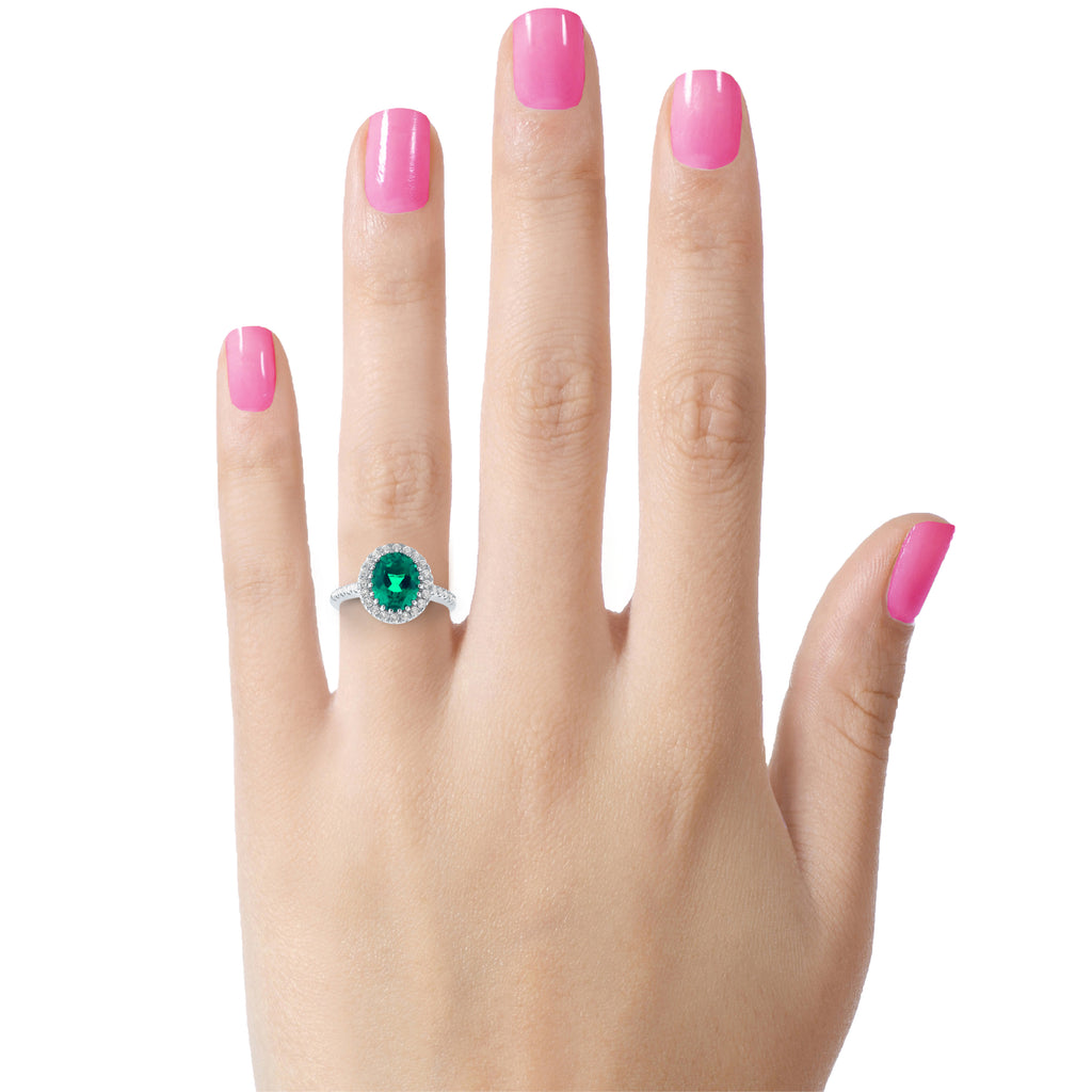 FJC Finejewelers Sterling Silver 8x10mm Oval Simulated Emerald and White Topaz accent stones Halo Ring