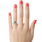 FJC Finejewelers Sterling Silver 3.28 cttw 8x10mm Oval Peridot and White Topaz accent stones Halo Ring