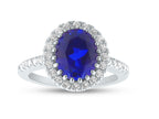 FJC Finejewelers Sterling Silver 5.70 cttw 8x10mm Oval Created Blue Sapphire and White Topaz accent stones Halo Ring